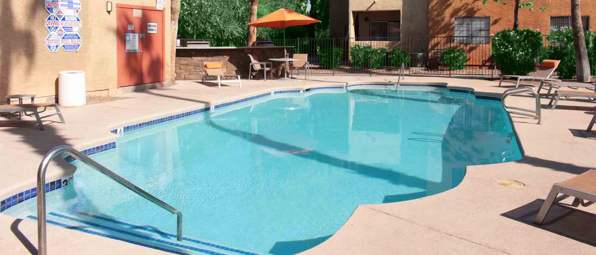This image shows the swimming pool of Ciel Apartments